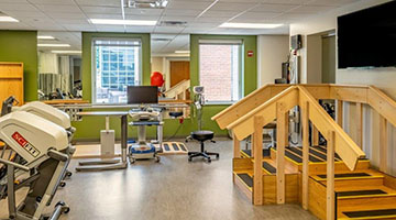 An exercise room full of treadmills